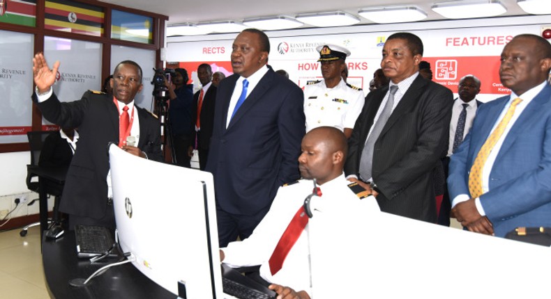 President Uhuru Kenyatta being briefed at KRA