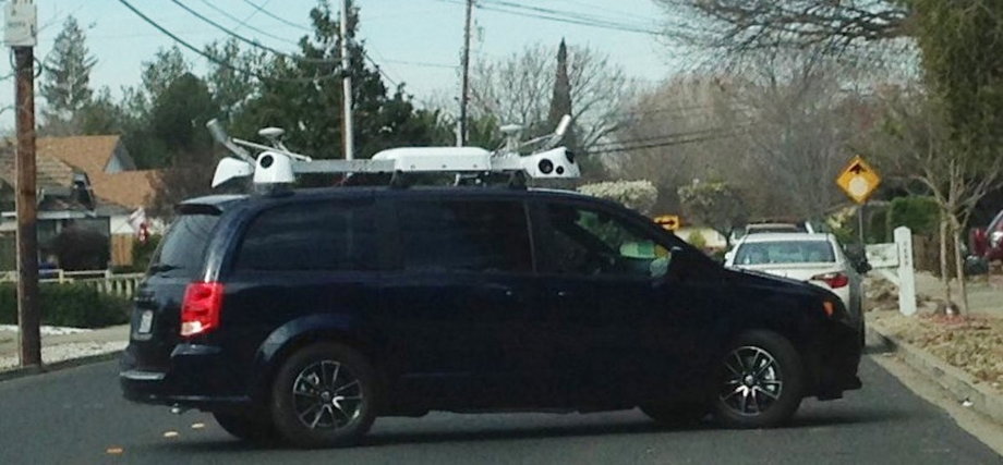 Apple has been driving around minivans with tech rigs attached to their roofs.