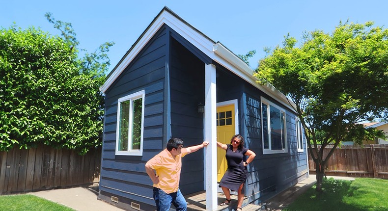 Jakota Rivas, right, in front of her ADU in Napa, California. She received a $40,000 state grant. Ryan O'Connell, left, is founder of How to ADU, a ADU advocacy company. Eric Santucci for Ryan O'Connell.