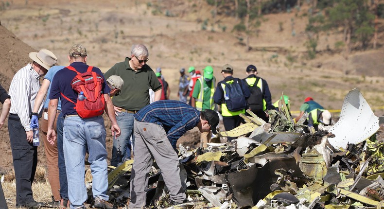 Investigators look through debris from the 2019 Boeing 737 MAX crash. Boeing's attorneys claim the plane hit the ground too fast for passengers to feel any pain.Jemal Countess/Getty Images