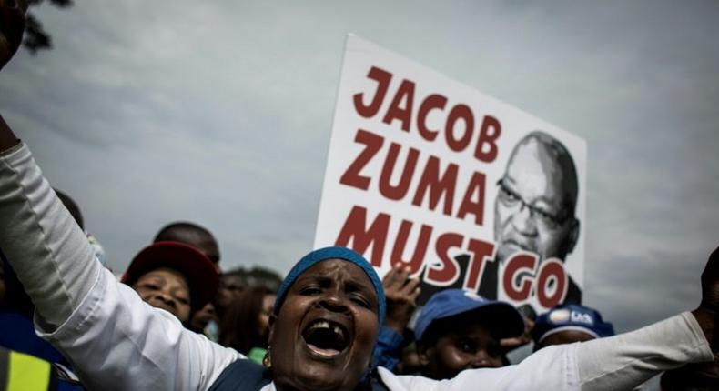 Democratic Alliance (DA) party supporters attend hold a protest march against South African president Jacob Zuma in Johannesburg on April 7, 2017