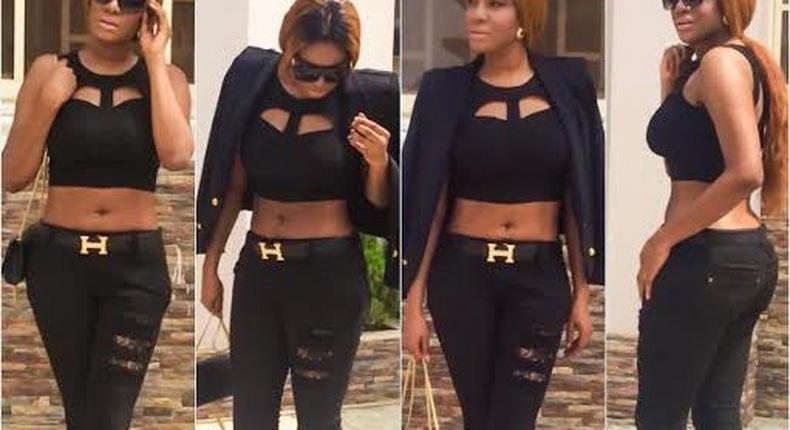 Chika Ike shows off her mid riff in an all black look