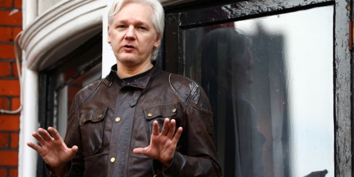 WikiLeaks founder Julian Assange is seen on the balcony of the Ecuadorian Embassy in London, Britain