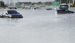 What's causing the rain and flood in Dubai? [AP]