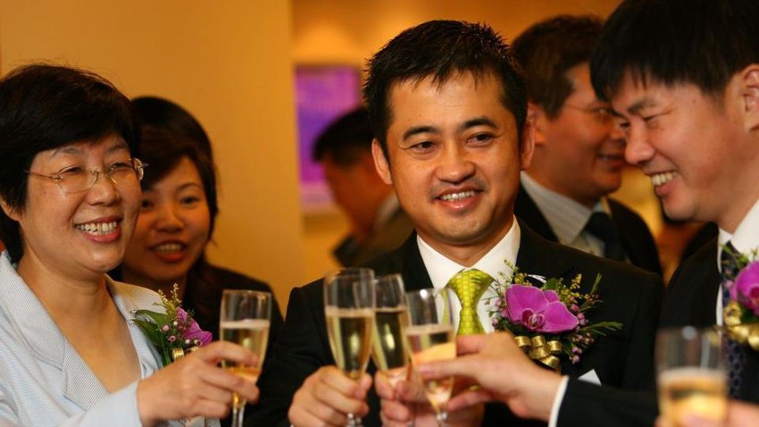 Predsednik kompanije Ante Ding Šidžung (u sredini), 2007. godine | Foto: Getty Images