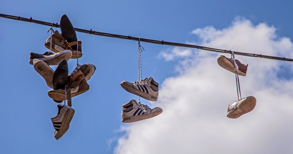 Shoefiti 5 meanings of shoes hanging on power and telephone cables