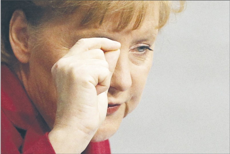 Merkel chce, aby banki uczestniczyły w ratowaniu Aten Fot. Reuters/Forum