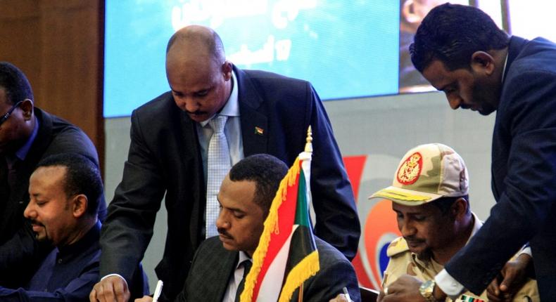 The signing of a transitional constitution in Sudan has opened the way for civilian rule in the once-pariah country