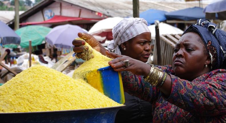 Garri seller in the market (image used for illustrative purpose) [Business Elites Africa]