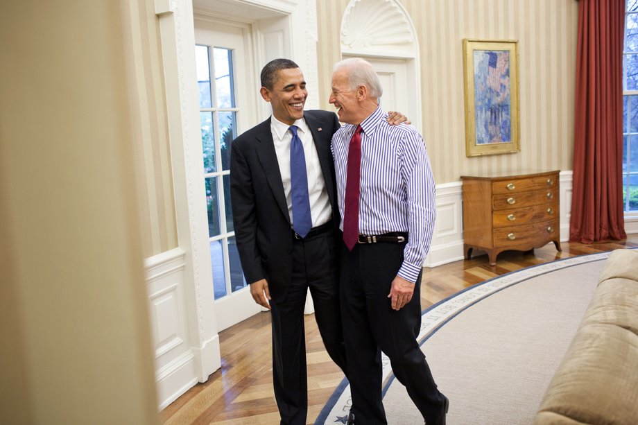 Obama embraces Biden in the Oval Office after a meeting on the budget on April 8, 2011.