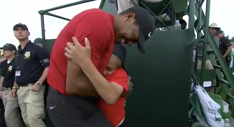 Tiger Woods celebrates with son