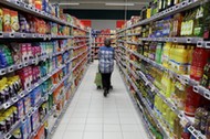 FILE PHOTO: A customer shops in a Casino supermarket in Nice