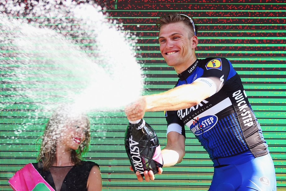 Spraying the bubbly is a tradition at the podium ceremony, and Kittel's a pro at this point.