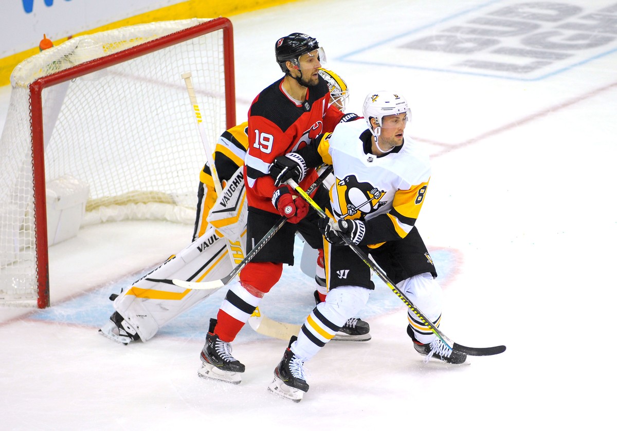 Travis Zajac i Brian Dumoullin