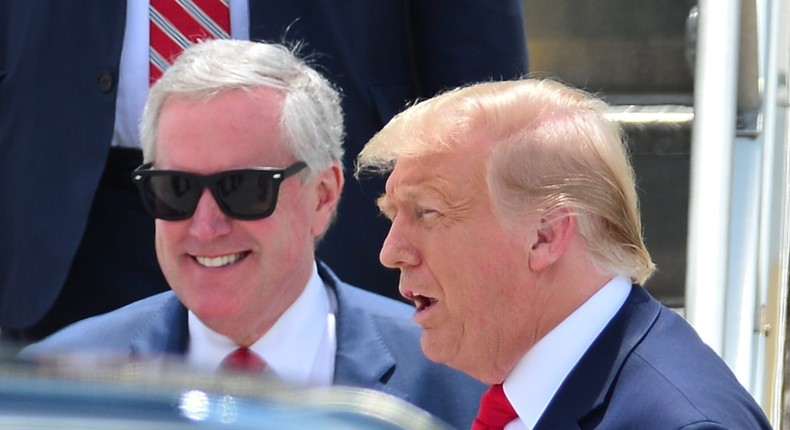 Mark Meadows, left, and Donald Trump, right, disembark from Air Force One on July 10, 2020.