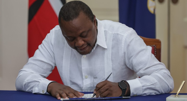 President Uhuru Kenyatta signing the IEBC (Amendment) Bill No. 3 at State House, Nairobi