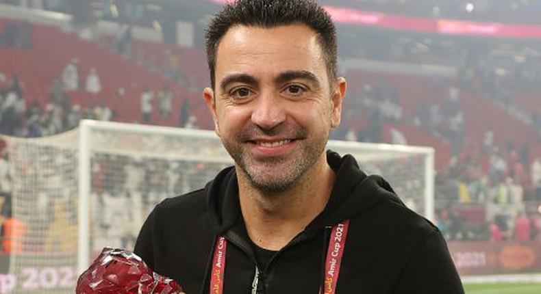 Xavi, who is coaching in Qatar, is the favourite to take over from Koeman Creator: KARIM JAAFAR