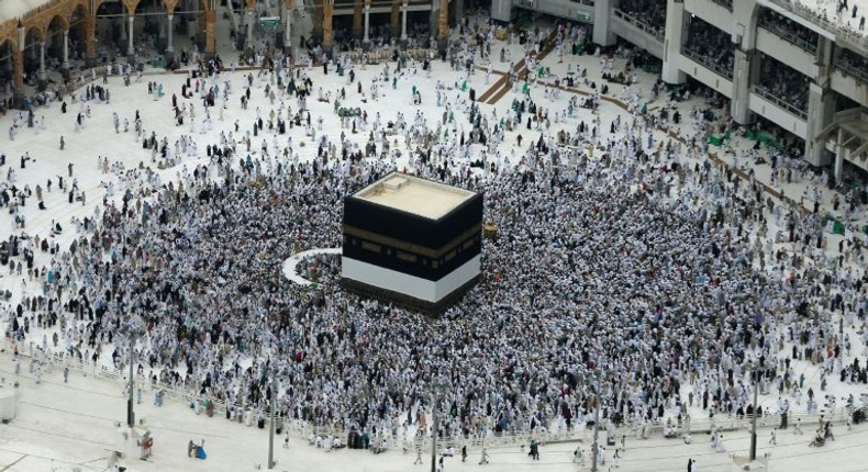 Muslim pilgrims circle the Kaaba at the Grand Mosque in the Saudi city of Mecca