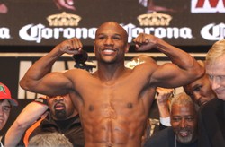 Mayweather pokonał Alvareza. Skandaliczna decyzja arbitra. WIDEO