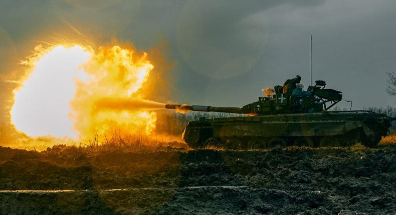 Ukrainian troops fire a captured Russian T-80 tank at Russian positions in the Donetsk region on November 22.AP Photo/LIBKOS