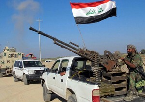 Pripadnici grupe Kataib Hezbolah u Džurf al Saharu na jugu Iraka 27. oktobra 2014.