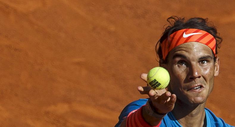 Spain's Rafael Nadal serves to Czech Republic's Tomas Berdych during their semi-final match at the Madrid Open tennis tournament in Madrid, Spain, May 9, 2015. REUTERS/Sergio Perez