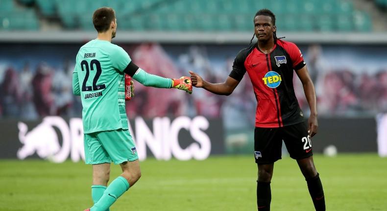 Hertha Berlin goalkeeper Rune Jarstein (L) celebrates with defender Dedryck Boyata after Wednesday's 2-2 draw at RB Leipzig.