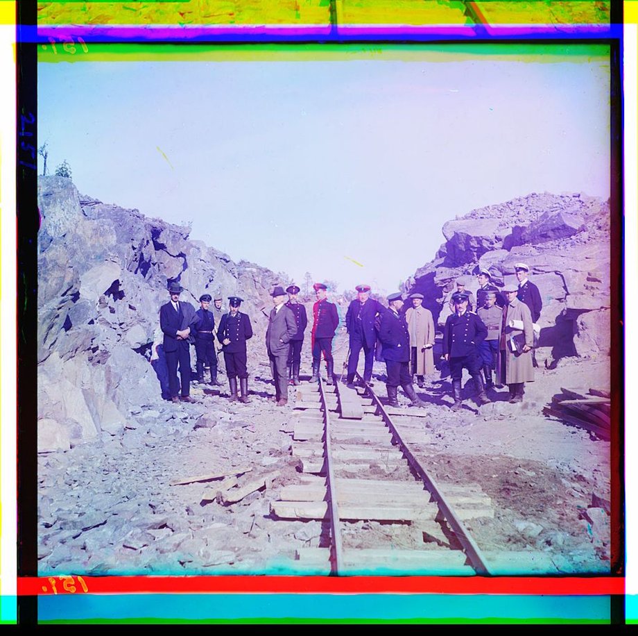 A group of railroad construction participants pose near the town of Kem.