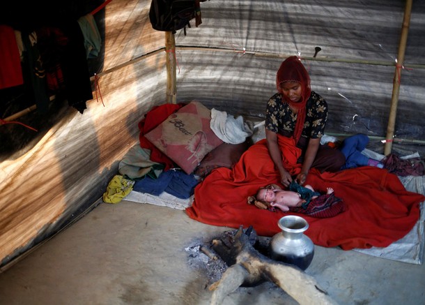 The Wider Image: Young Rohingya mothers flee persecution