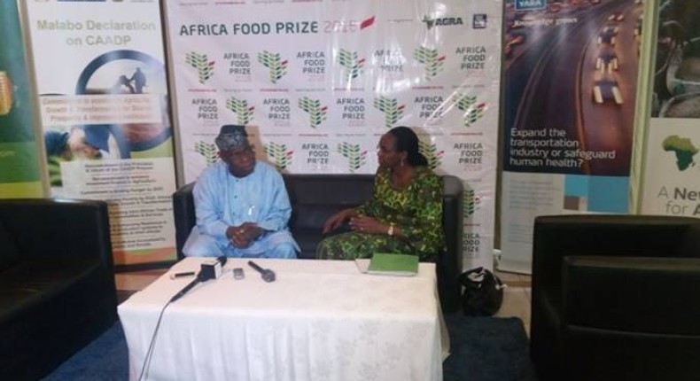 Olusegun Obasanjo , left .