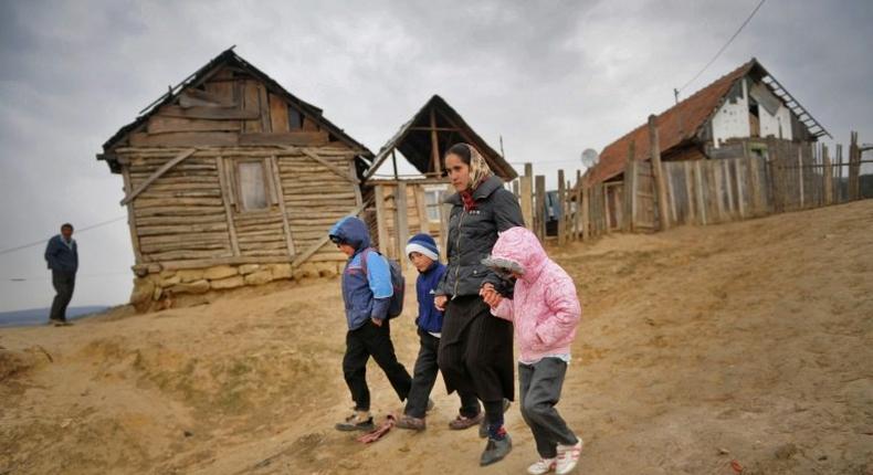 EU statistics agency Eurostat found that 46.8 percent of Romanian children, as pictured here in a village north of Bucharest, are at risk of poverty and social exclusion