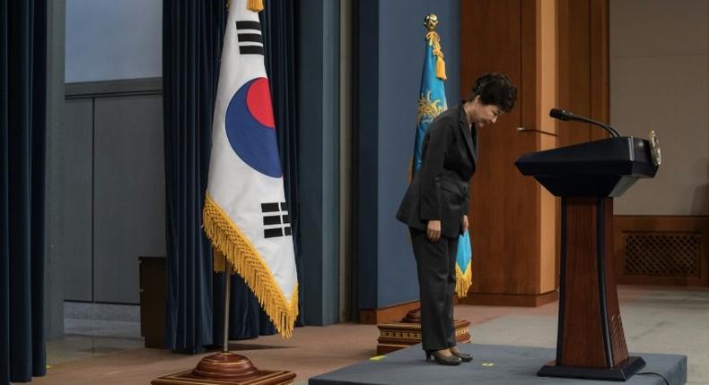 South Korea's President Park Geun-Hye bows prior to delivering an address to the nation, at the presidential Blue House in Seoul, on November 4, 2016