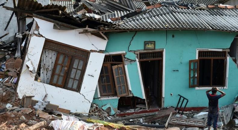 Some 145 homes were destroyed when the 300-foot (90-metre) rubbish mountain came crashing down and police say many more buildings were damaged and could collapse at any time.