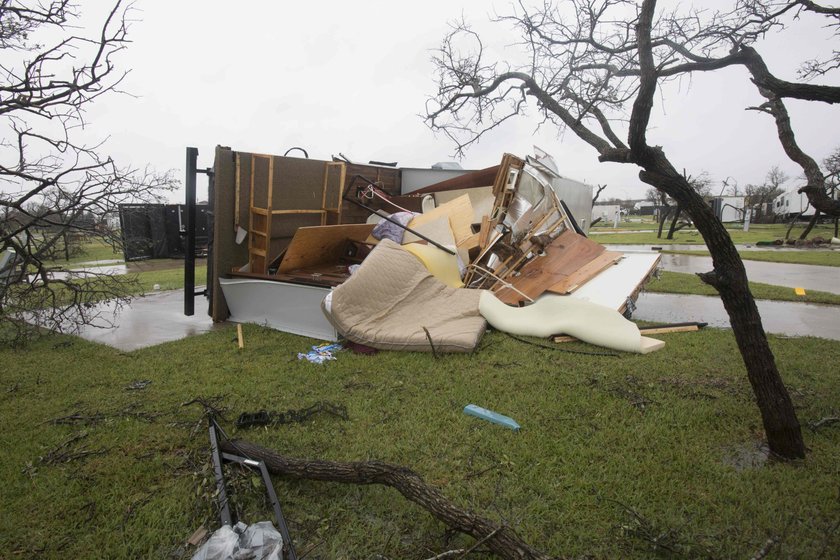 A man, who lost his home to Hurricane Harvey, is loaded into the back of an ambulance in Rockport, T