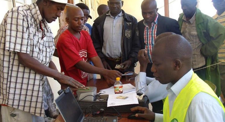 An Independent Electoral and Boundaries Commission official registers voters in Eldoret town.