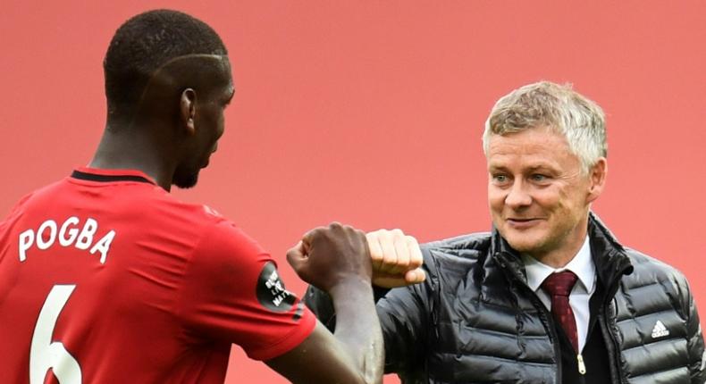 Ole Gunnar Solskjaer (right)is keen for Manchester United to extend Paul Pogba's (left) contract