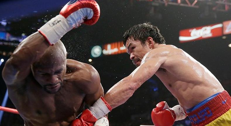 Pacquiao hits hard at Mayweatherin this round