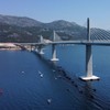 Brijesta, Croatia, July 26, 2022. Aerial view of the traditional race of Neretva Boats under Peljeski Bridge has been held as part of the bridge opening program in Brijesta, Croatia on July 26, 2022. 2.404 meters long bridge is constructed in 4 years by C