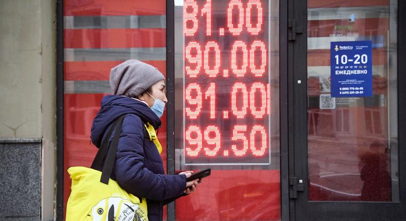 Russia's economy has been hit hard by sanctions, which are complicating the government's efforts to pay its debts.ALEXANDER NEMENOV/Getty Images