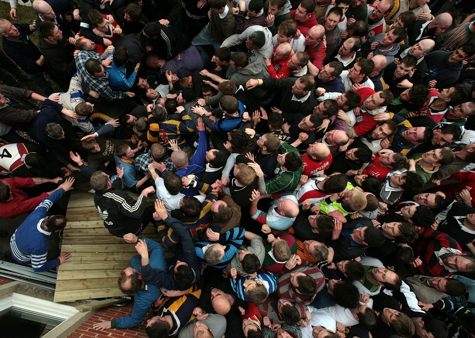 Enthusiasts Participate In The Royal Shrovetide Football Match