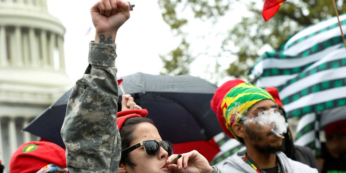 Protesters smoke marijuana on steps of the U.S. Capitol