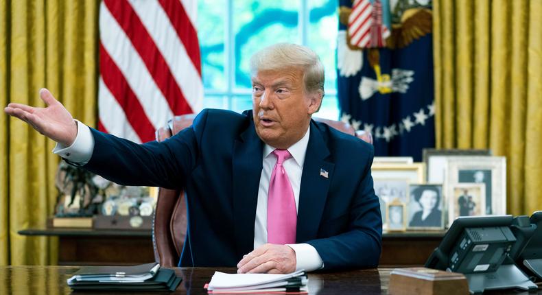 Then-President Donald Trump talks to reporters while hosting Republican Congressional leaders and members of his Cabinet in the Oval Office at the White House on July 20, 2020.Doug Mills-Pool/Getty Images