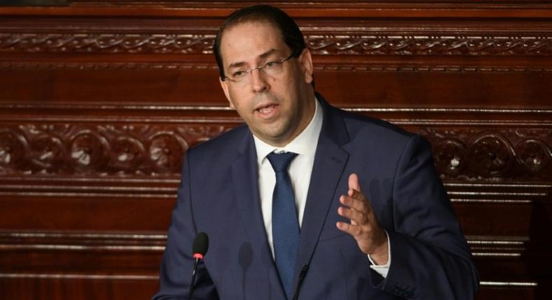 Tunisian Prime Minister Youssef Chahed gives a speech prior to a confidence bill during a plenary session of parliament on July 28, 2018