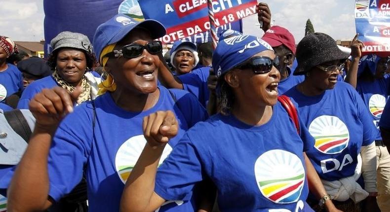 Democratic Alliance (DA) supporters chant slogans during an election campaign in Soweto May 6, 2011. South Africans will vote in municipal elections on May 18, 2011. REUTERS/Siphiwe Sibeko