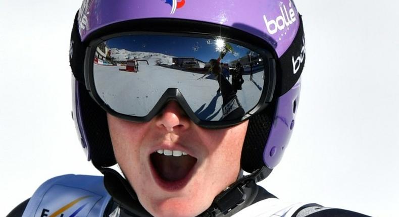 France's Tessa Worley celebrates after winning her fourth world ski title durin the giant slalom in St Moritz, on February 16, 2017