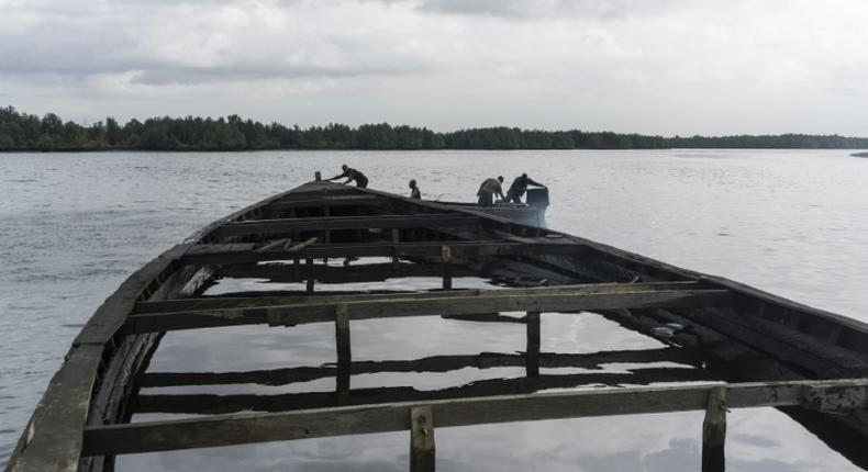 Nigeria's oil-rich Niger delta is prone to corruption and mismanagement, officials say. Here we see an abandoned boat filled with oil near the city of Port Harcourt