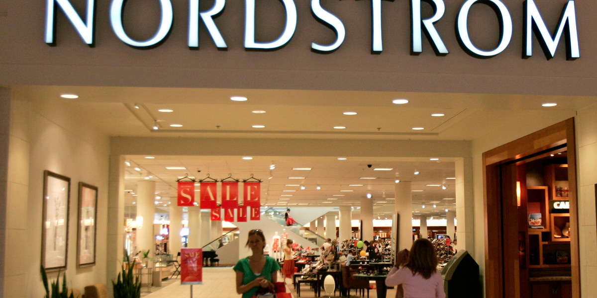 Shoppers walk at the entrance of the Nordstrom store in Broomfield, Colorado June 7, 2007.