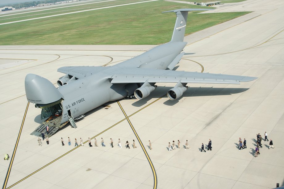 The C-5 Galaxy absolutely dwarfs humans.