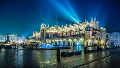 Poland, Krakow. Market Square at night.