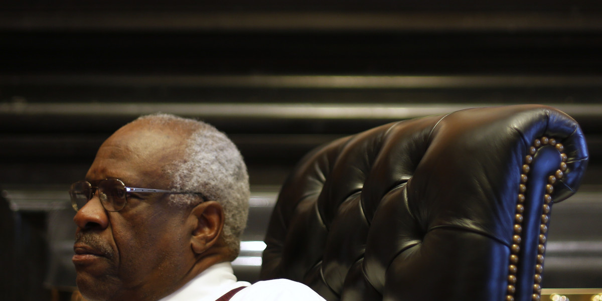 U.S. Supreme Court Justice Clarence Thomas sits in his chambers at the U.S. Supreme Court building in Washington, U.S. June 6, 2016.